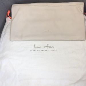 India Hicks leather clutch with dustbag